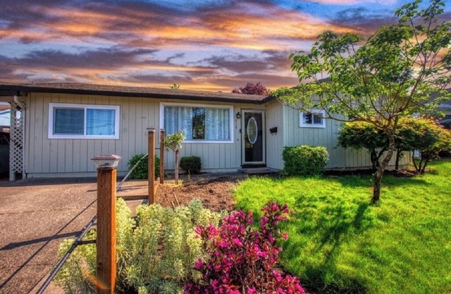 Garden House fenced yard with covered patio. Pets okay. Close access to shops.