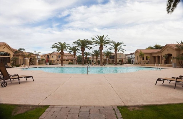 Gated townhouse with 2 suites, heated pool and spa