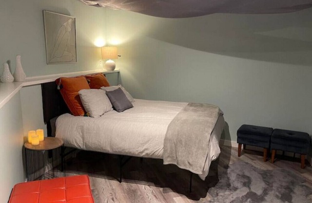 Geodesic Dome bedroom with shared cedar hot tub