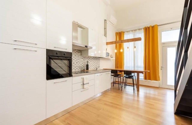 Gina Guest House. Near the center. All comforts, internet included.