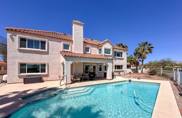 Golf-course-front home with private pool, hot tub, terrace & mountain view