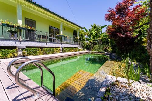 Gondomar Guimarães - Moradia V3 com piscina natural by House and People