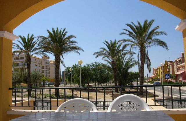 Ground floor apartment, large patio, free wifi, communal pool, parking