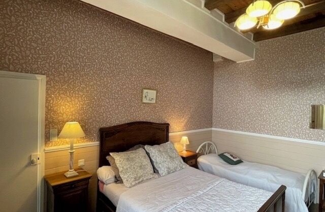 Guest room on the ground floor of the Domaine de Braffais