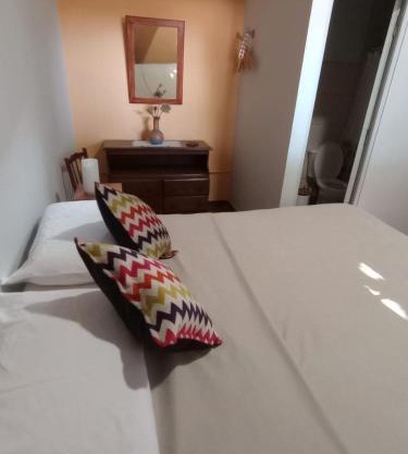 Habitación en Ciudad con baño privado en suite y cochera