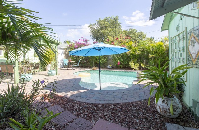 Hidden Private Tropical Oasis with Two Cottages, Pool and Gorgeous Gardens