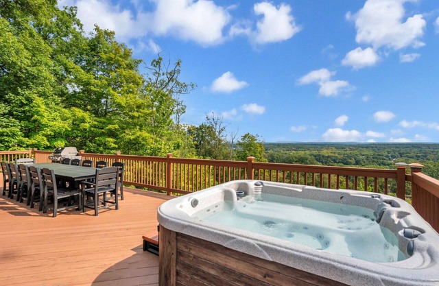 Hilltop A-frame chalet, skyline views, heated pool and hot tub, expansive.
