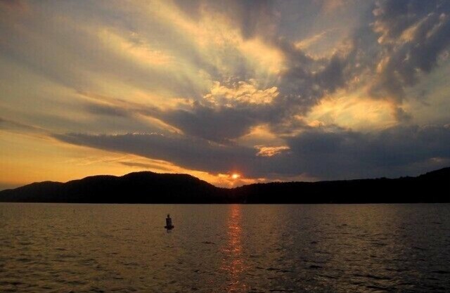 HISTORIC ADIRONDACK CAMP WITH 100 FT OF LAKE FRONTAGE & ALL MODERN AMENITIES