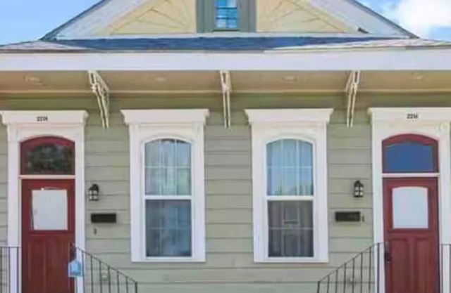 Historic and Stylish Shotgun Duplex Gem with Courtyard! 2/2