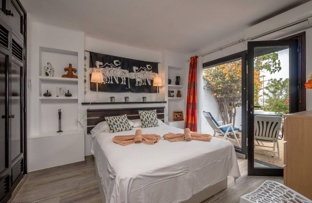 Holiday Apartment "Puerto Chico I & J" with Sea Views, Private Terrace, Shared Pool & WiFi