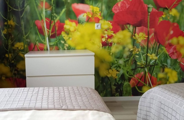 Holiday Apartment 'Haus Abendsonne Hochparterre Klein' with Shared Terrace, Balcony and Wi-Fi