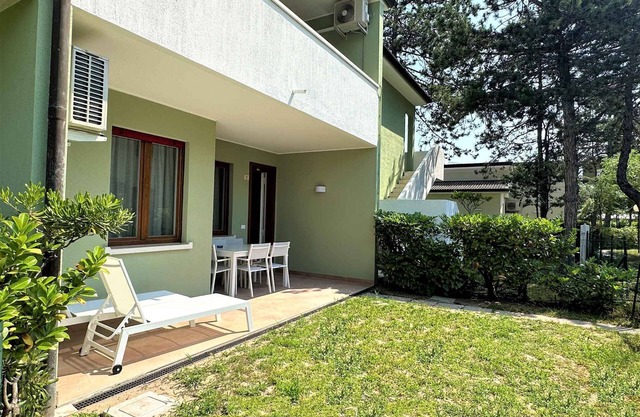 Holiday apartment modernly furnished with pool