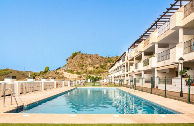 Holiday Apartment "Oasis En Enix" with Sea View, Shared Pool & Wi-Fi