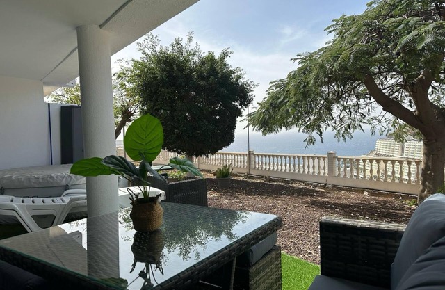 Holiday Apartment 'Views Of Sunsets' with Sea View, Shared Pool and Wi-Fi