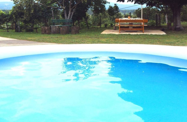 Holiday apartment with balcony and assembly pool