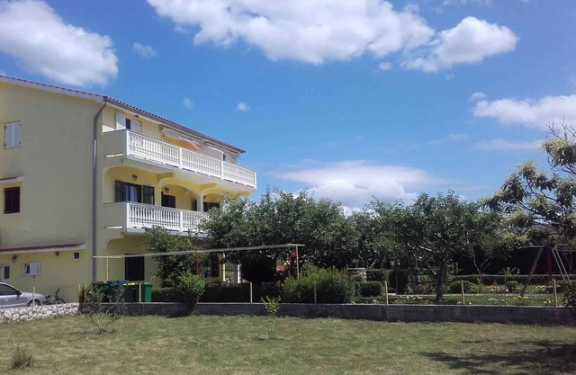 Holiday apartment with barbecue and children's playground