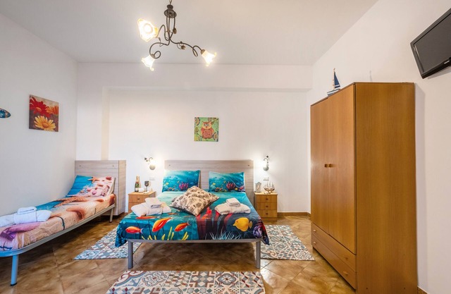 Holiday Home 'Riviera Luxury Room BeB Controvento' with Sea View, Wi-Fi and Air Conditioning