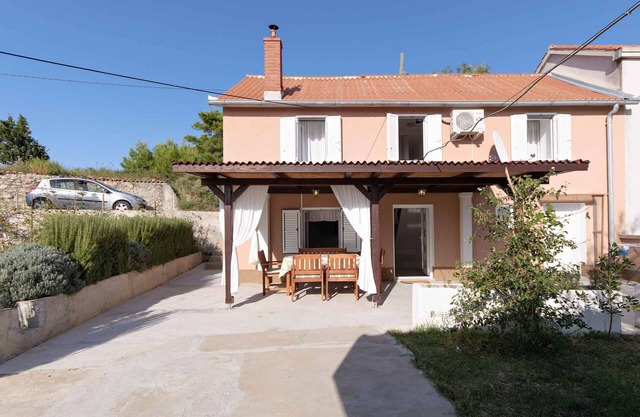 Holiday home with terrace and barbecue