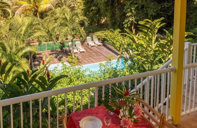 Holiday house with pool in a tropical garden, close to the beach