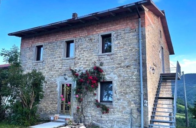 House in the woods with mountain views