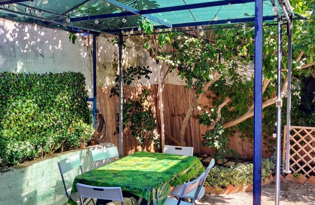 House of Ulysses: private garden and parking.
