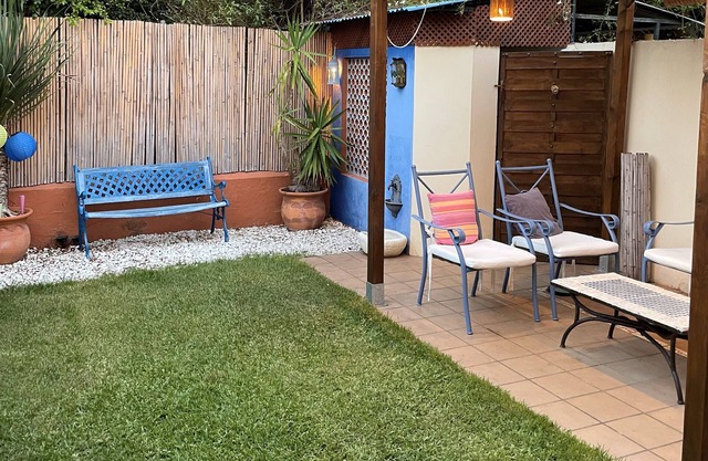 House with garden in closed urbanization.