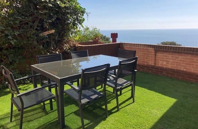 House with private garden overlooking the sea