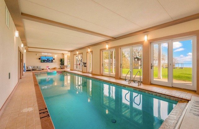 Insane luxury beachfront estate - complete with indoor pool, arcade and theater!