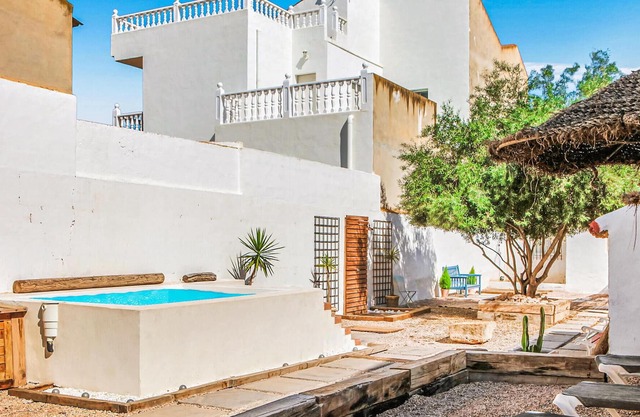 Inviting cottage in rustic style with private outdoor pool.