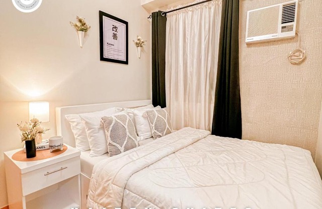 Kaizen Suites at Trees Residences - 2BR with PS4, Netflix, Disney plus, Unli Wifi and Popcorn