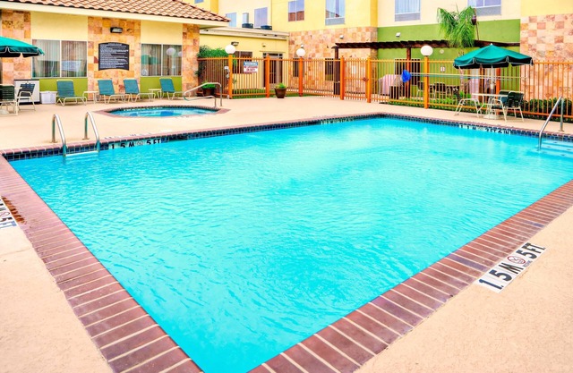 King Suite Near LRD | Free Breakfast, Pool & Hot Tub Access