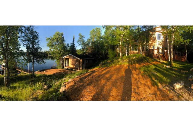 Lake cabin on 5 acres and 780' of shoreline on an island with panoramic views.