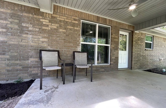 Lake house getaway on quiet Lake Hawkins with lake access and boat pier.