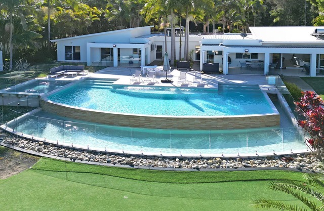 Lake Palm Resort Luxury Retreat absolute Waterfront on 3 acres at Lake Macquarie.