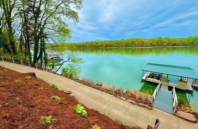 Lakefront Home with Dock & INDOOR Pool & KING BEDS! Great parking options!