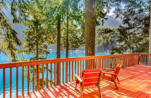 Lakefront home with stunning views, private hot tub, dock & 2-story deck