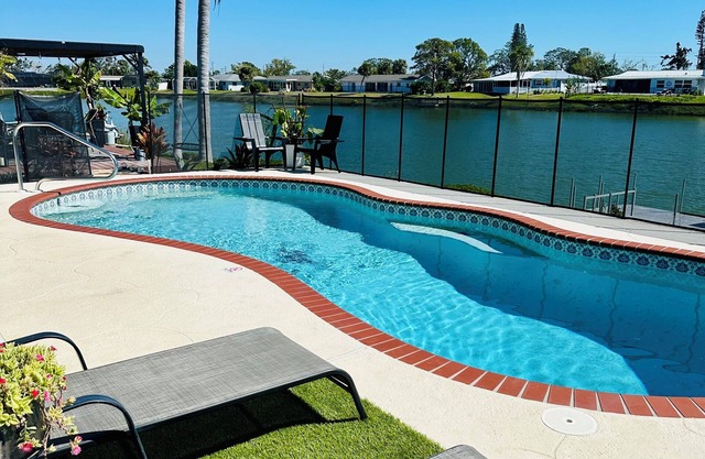 Lakefront Retreat with pool, close to beach!