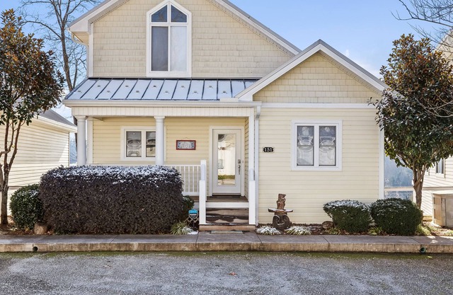 Lakeview home with pool, balconies, washer/dryer, fireplace, & cable