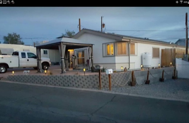 Large home, hilltop community on the Parker strip