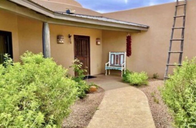 Large private, high end home with sweeping views on 13 acres.