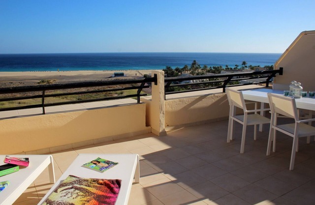 Large sun terrace with a view over the beach of Jandia