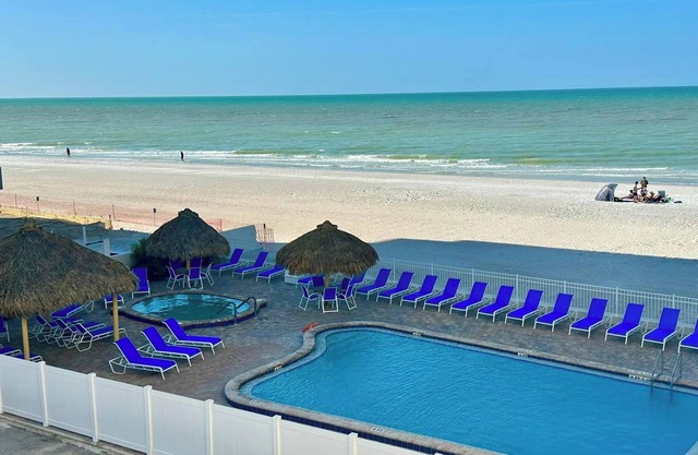 “ Living the Dream “ in our 3 bedroom 3 bathroom beachside condo with pool!