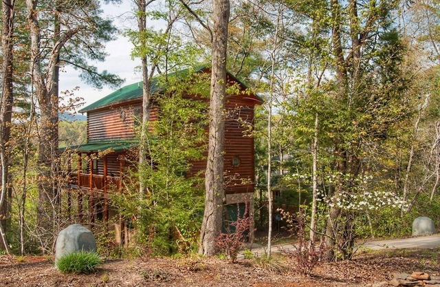 Log home on the river with mountain views