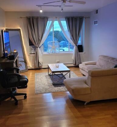 Lovely 1-bedroom condominium with free designated parking on premises