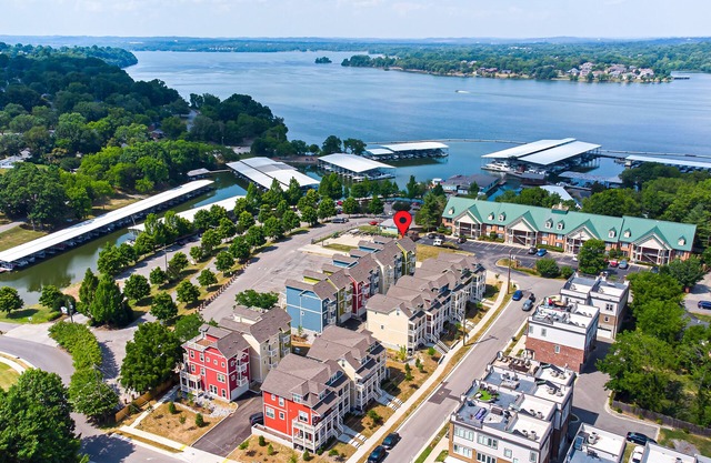 Lovely townhome with water-view, balcony, central AC & washer/dryer