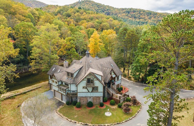 Luxe Riverfront Escape with Panoramic Mountain Views + Pickleball Court