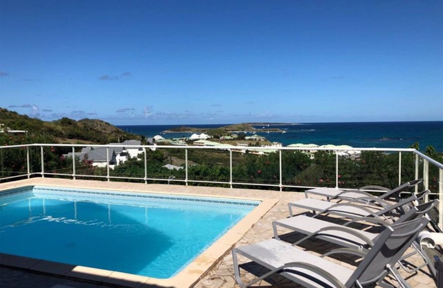 Luxurious Caribbean Contemporary Charm with Breathtaking Panoramic Ocean View
