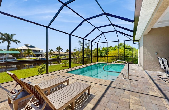 Luxurious waterfront home, pool, Gulf access, and pool table