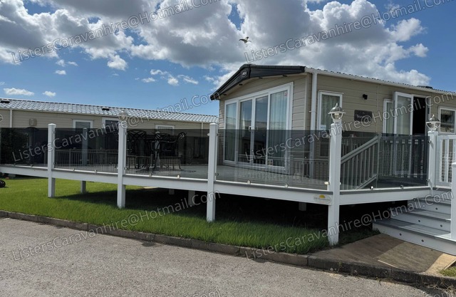 Luxury 2 bedroom family caravan, with decking and close to the beach.