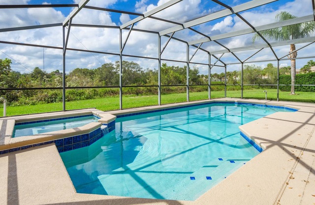 Luxury 5 bed 4 bath SW facing pool with conservation and lake view